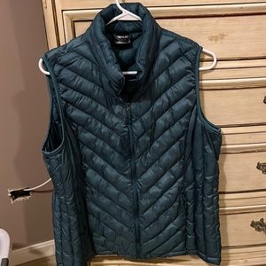 Zip up vest. Light blue green. Size xl. Great for layering for fall or winter.